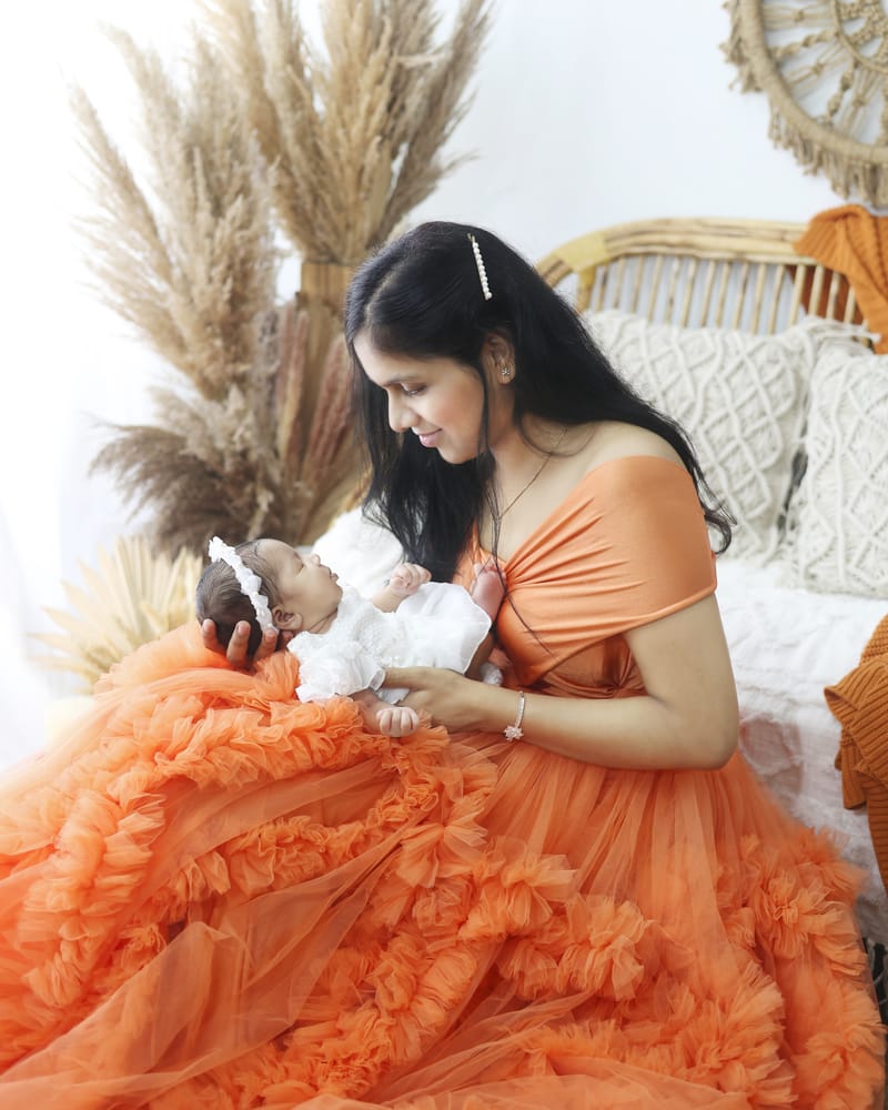 Parents gazing at their newborn lovingly