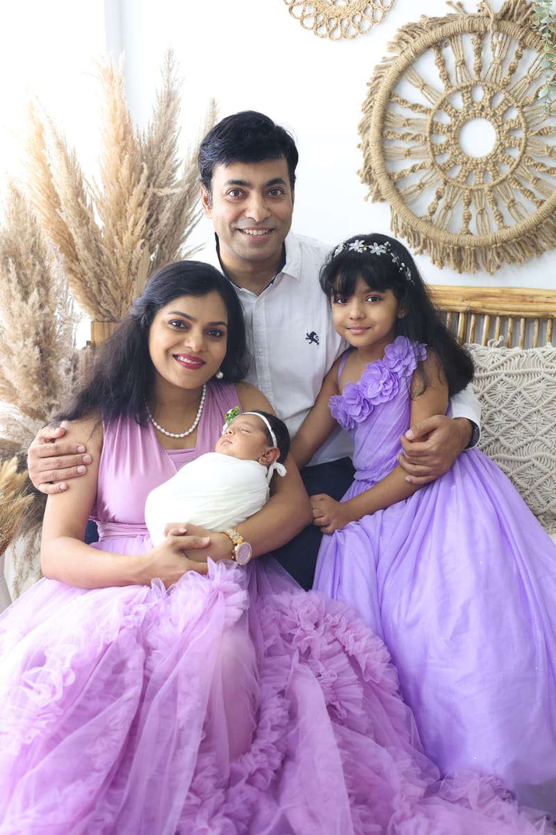 Family portrait with artistic studio lighting