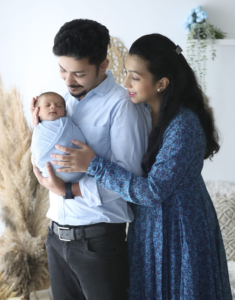 Family of four in a heartwarming group pose