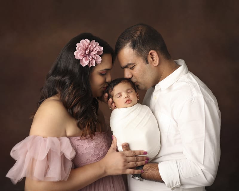 Family session capturing genuine laughter