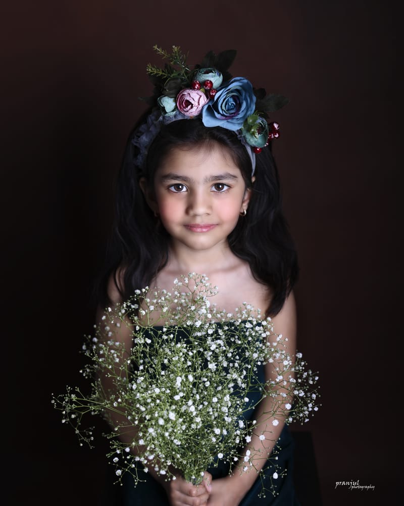 Kid laughing in a candid studio moment