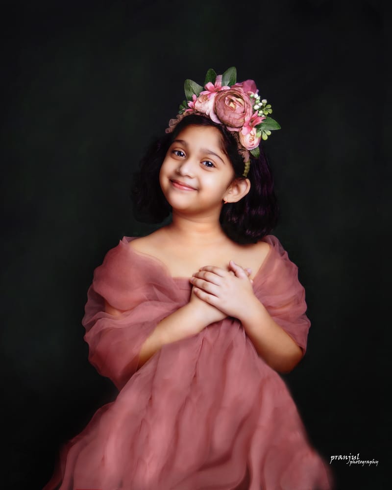 Child posing with a confident smile