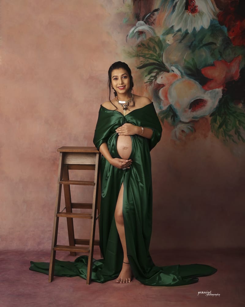 Maternity couple photography with tender embrace