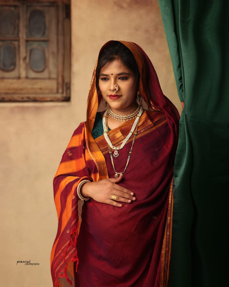 Maternity gown portrait with artistic pose