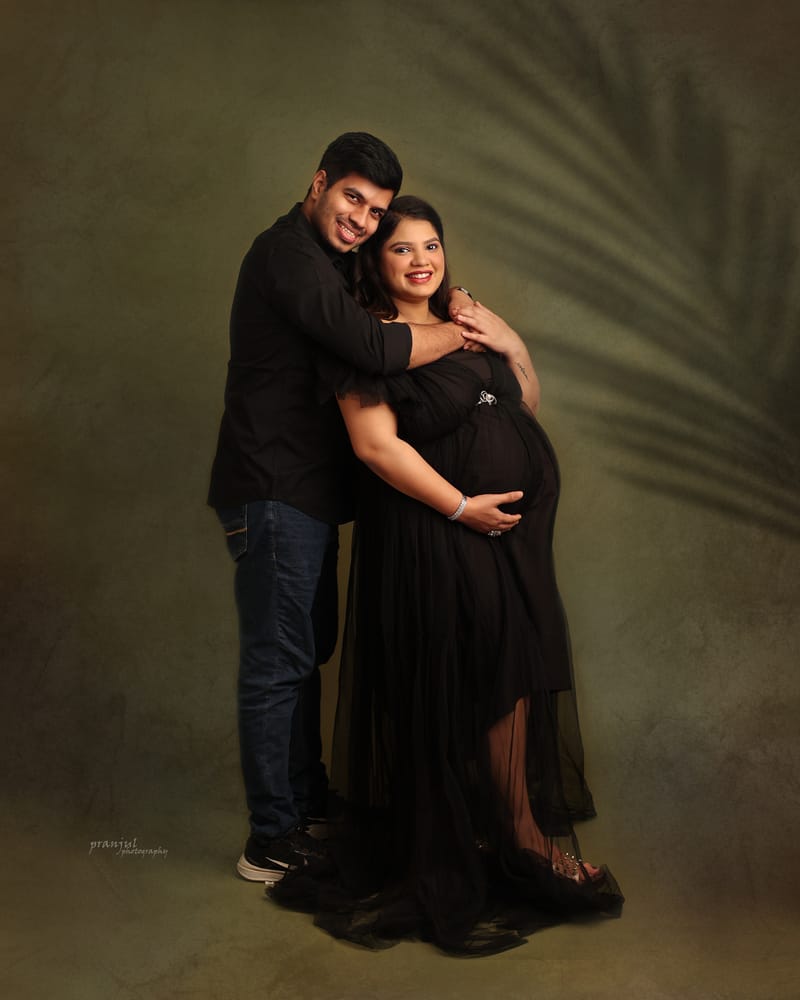Creative maternity photography with fabric drapes