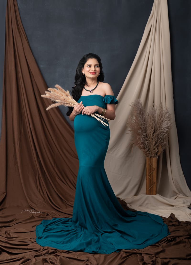 Maternity couple portrait with intimate styling