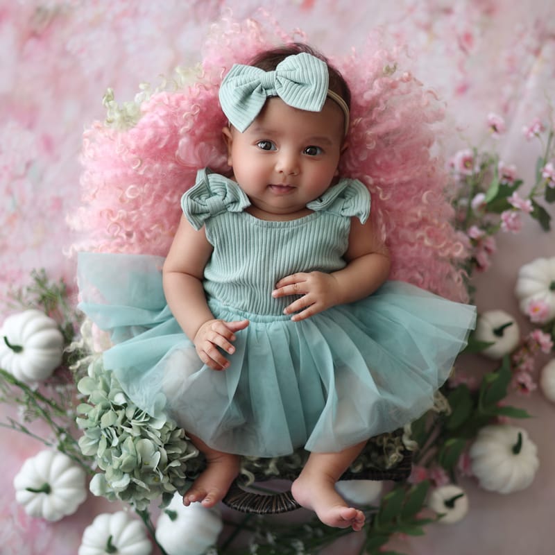 Newborn baby sleeping peacefully in a wrap