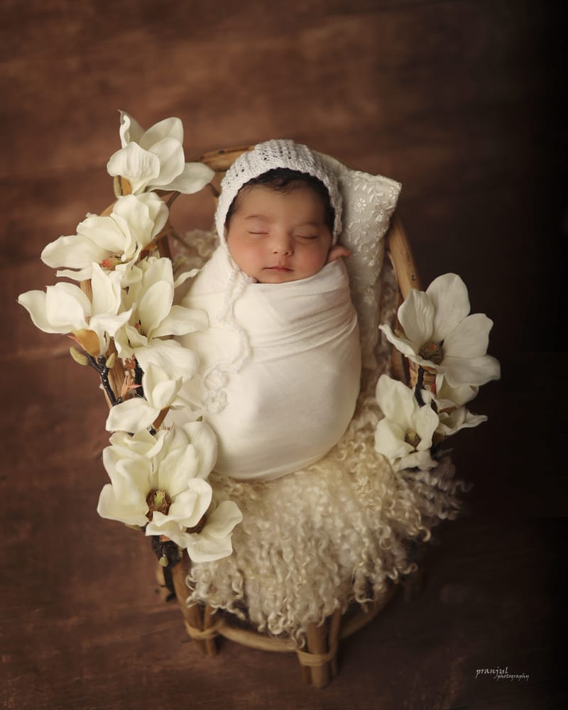 Close-up of newborn baby hands and feet