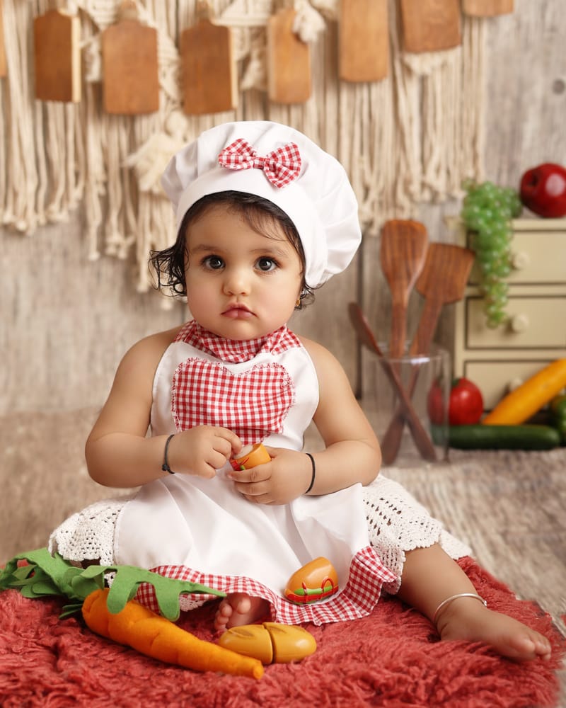 Toddler birthday photoshoot with colorful decorations