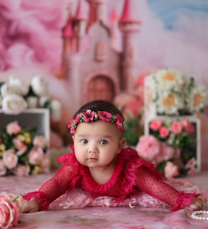 Toddler smiling in a creative studio arrangement