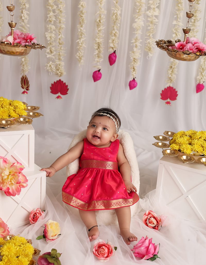 Toddler playing with props in a fun photoshoot