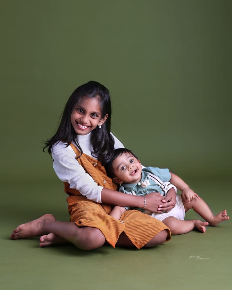 Toddler laughing in a candid studio capture