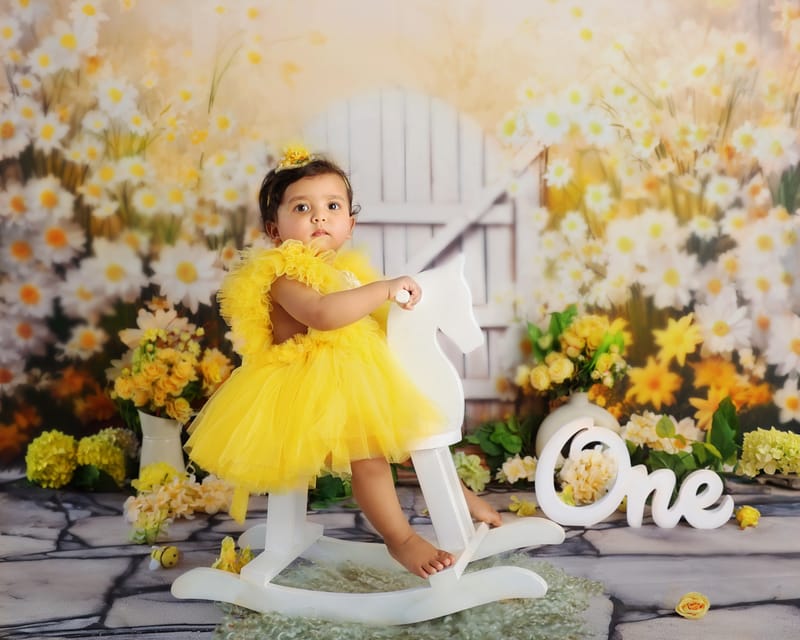 Curious toddler discovering studio props