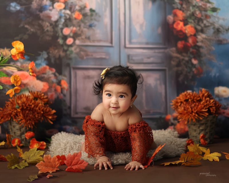 Toddler milestone session with balloon decorations